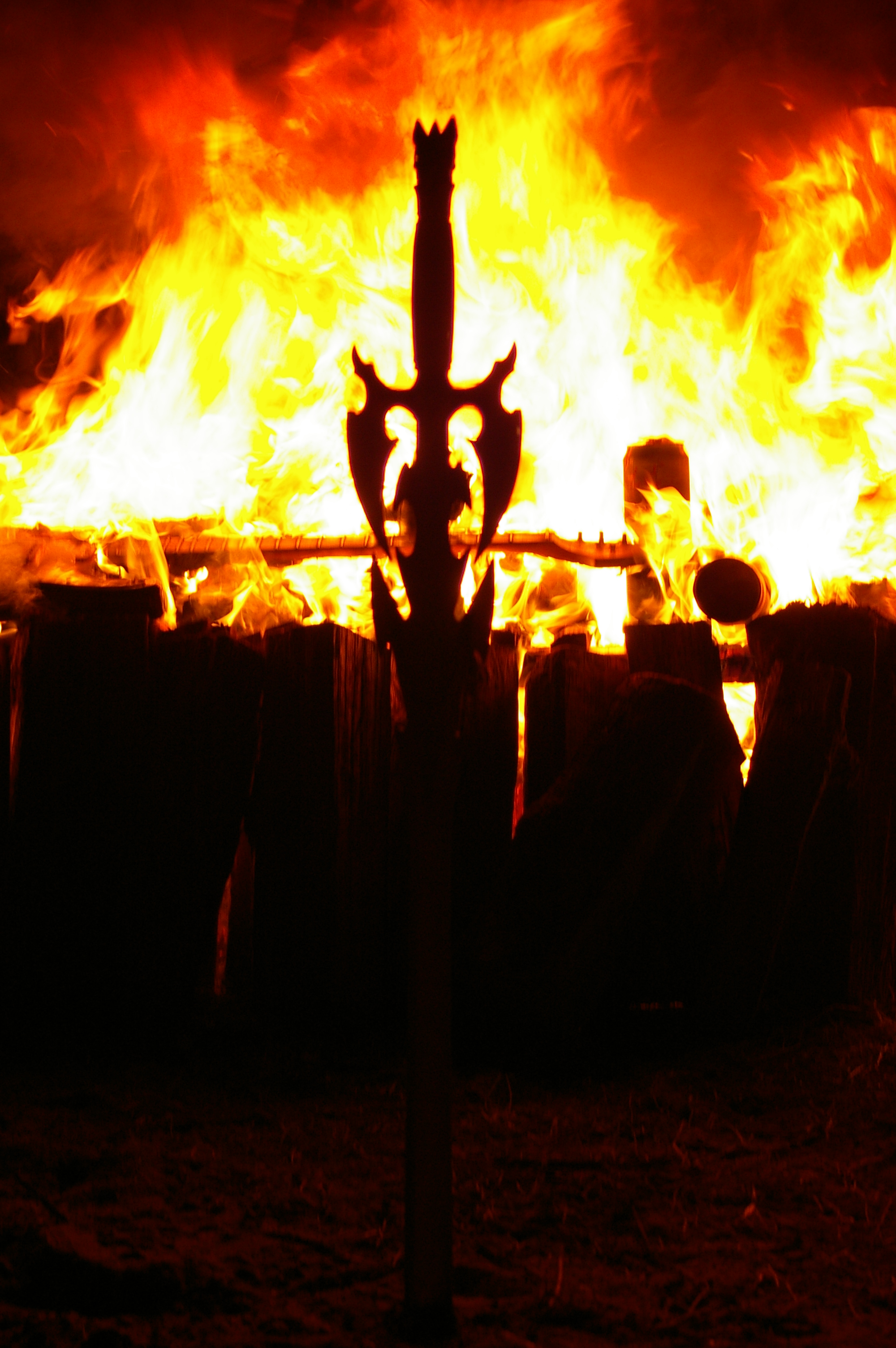 Flaming pyre and Joe's sword